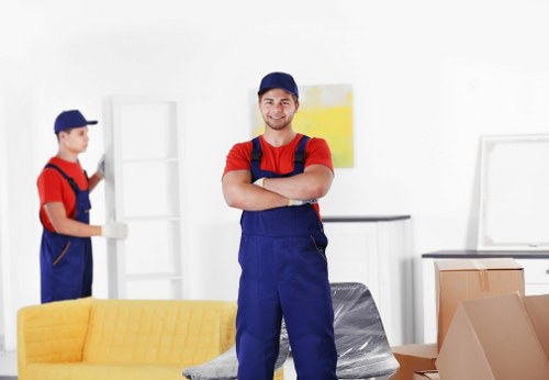 Moving crew handling access and loading for a flat move in Queens Park