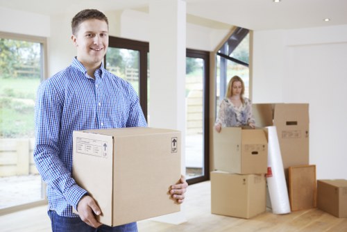 Queens Park removals team handling belongings with care