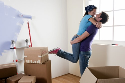 Queenspark movers loading furniture carefully during a local relocation