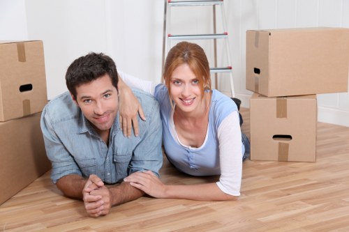 Local removals team handling household furniture during a Queenspark move