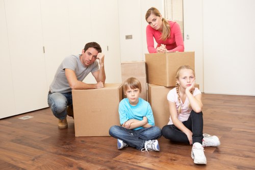 Packed boxes and furniture prepared for removal truck hire