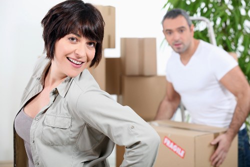 Careful packing of books and electronics for a student move