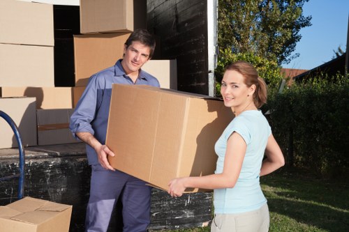 Prepared piano moving team planning a safe removals route in Queenspark